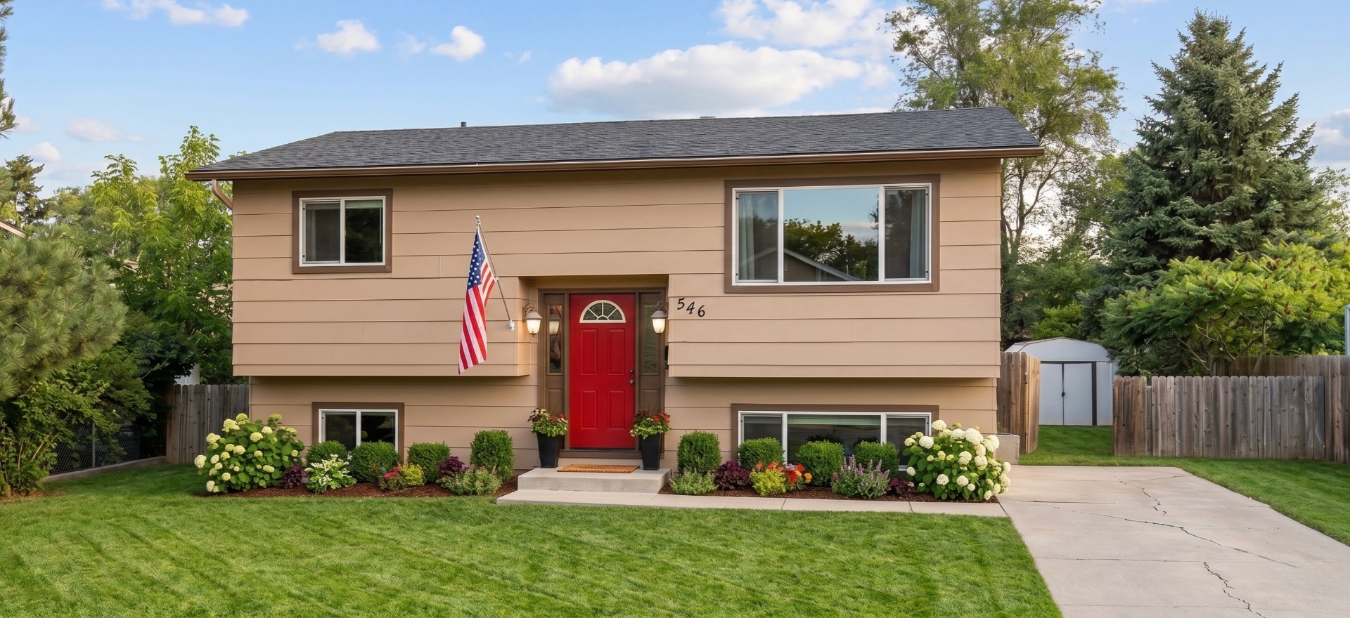 Rising Sun Twin Falls split-level home with red door and American flag