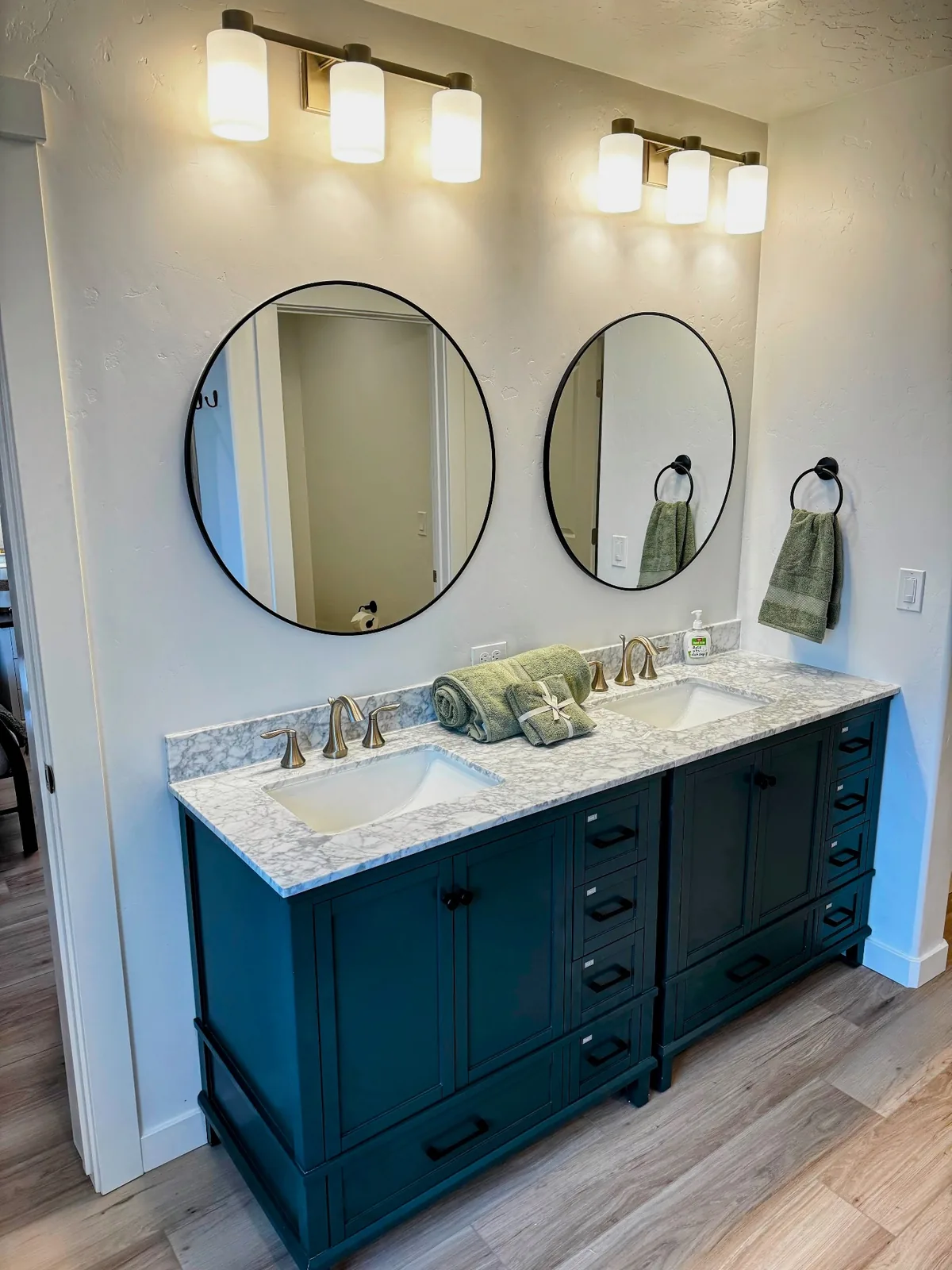Modern double-vanity bathroom with marble counter